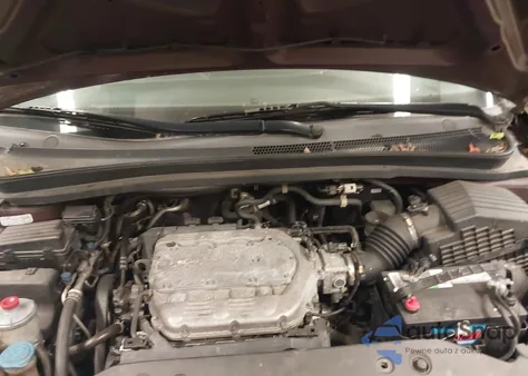 2010 Honda Odyssey Exl z USA, uszkodzony, nr VIN 5FNRL3H7XAB033737